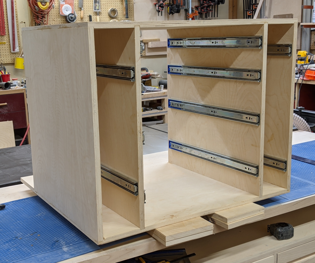 Glued-up carcase with drawer hardware